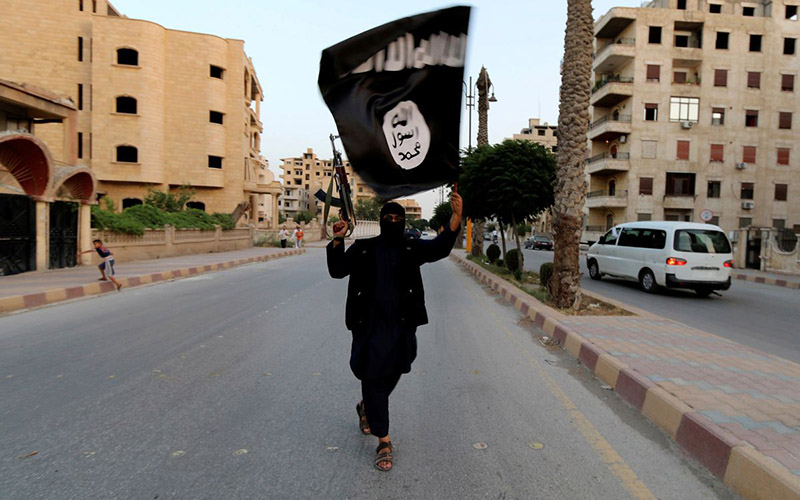 Thành viên trung thành với IS xuất hiện tại Raqqa, Syria, ngày 29/6/2014. (Ảnh: Reuters)