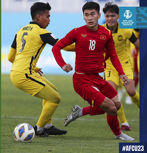 Cầu thủ Nhâm Mạnh Dũng, tác giả pha đánh đầu mở tỷ số cho U23 Việt Nam trong trận đấu với U23 Malaysia. (Nguồn: afc)